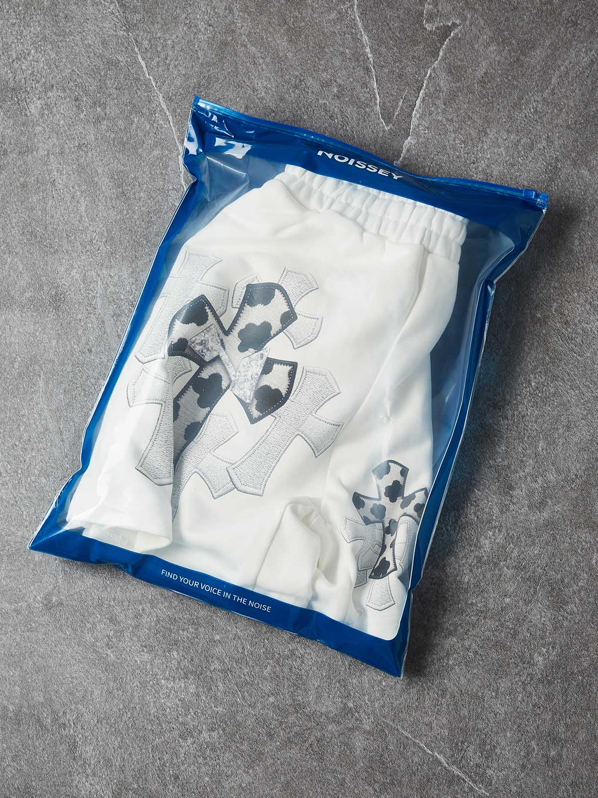 NOISSEY "COW CROSS" MONOCHROME APPLIQUÉ WIDE-LEG SHORTS - Image 6
