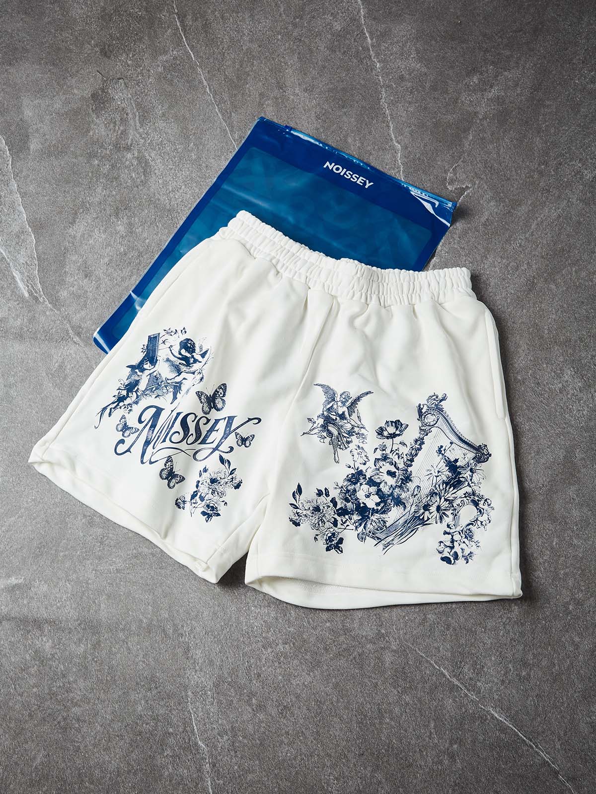 NOISSEY "Heavenly Garden" Blue Angel & Floral Art Print White Wide-Leg Shorts - Image 7